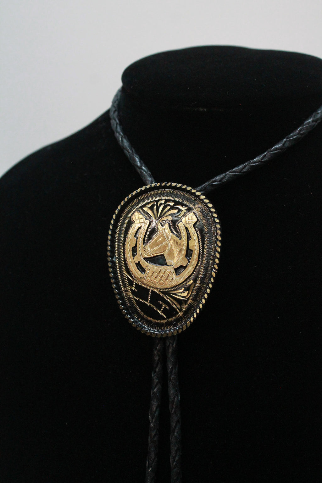 Two Tone Oval Horse & Horseshoe Bolo Tie