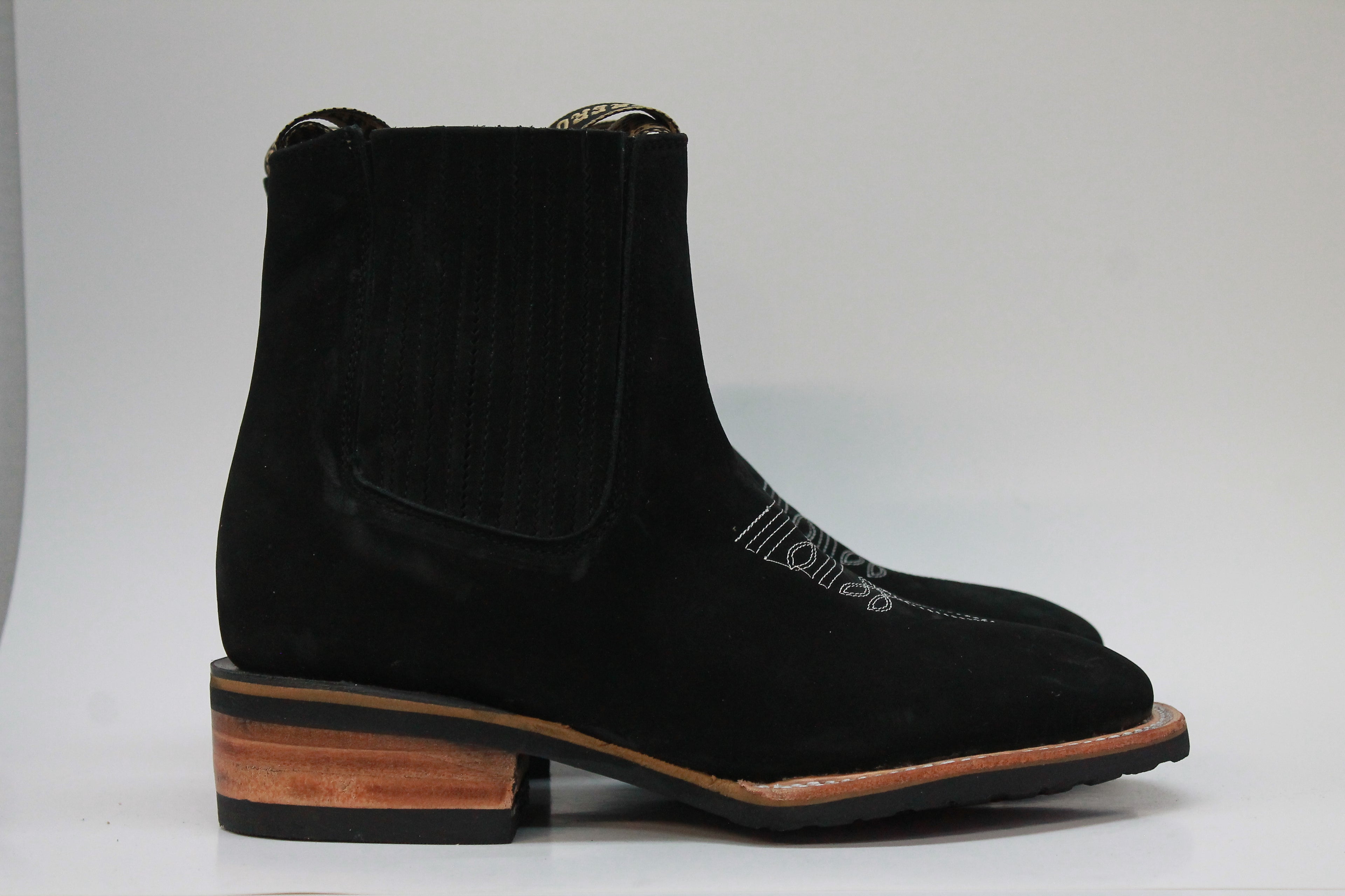 Ankle-Length Suede Boot with Medallion