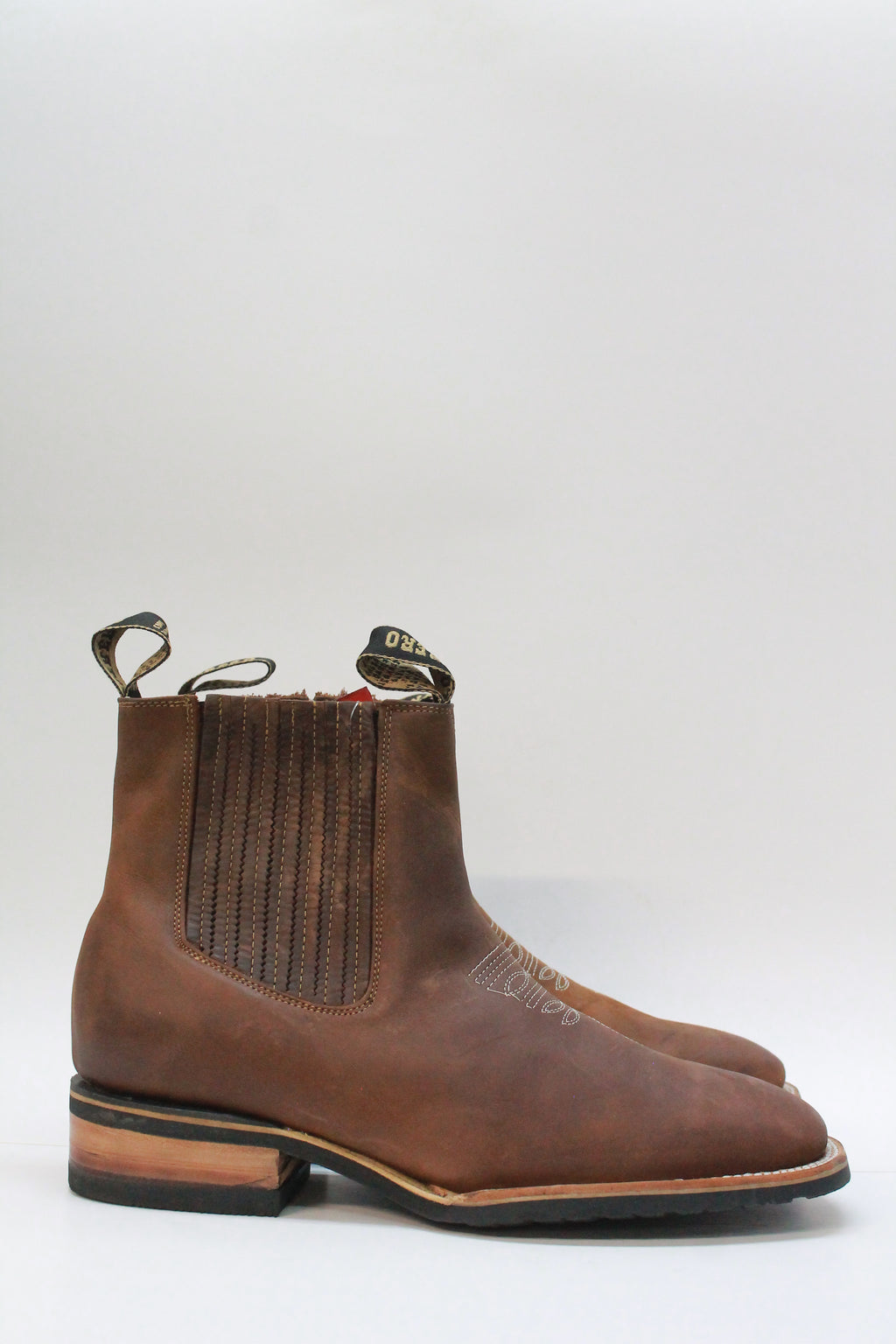 Ankle-Length Suede Boot with Medallion