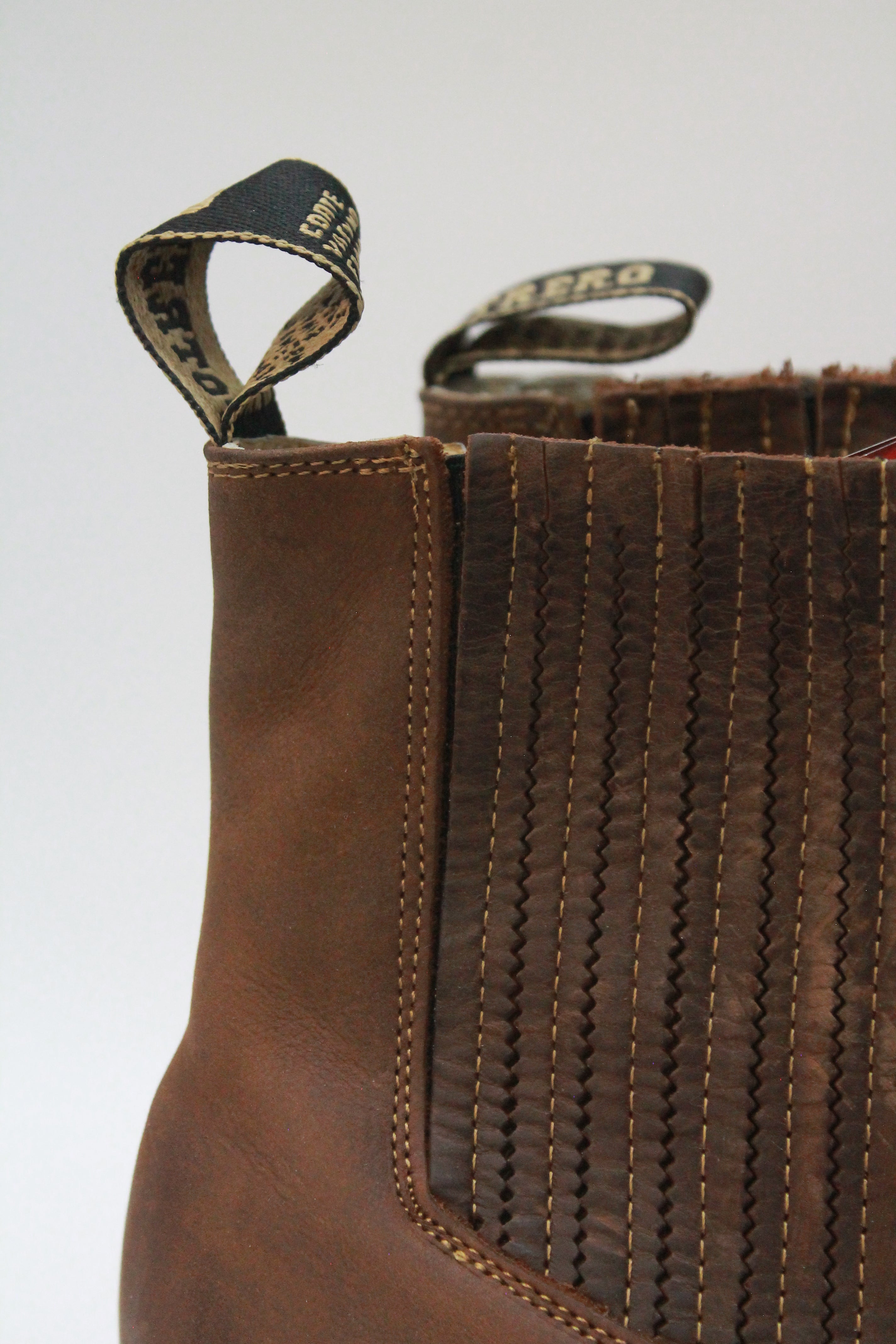 Ankle-Length Suede Boot with Medallion